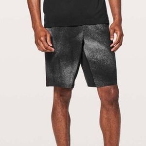 (A4) Lululemon men's athletic shorts, black and grey, size M.